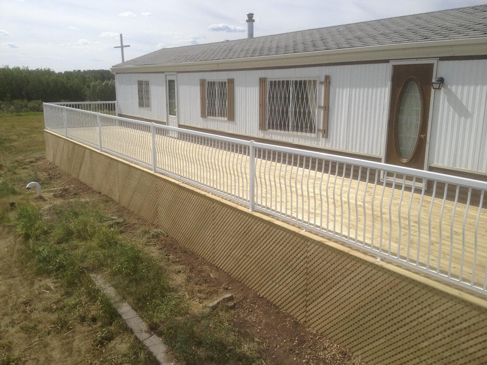 Outside deck repair finished with railing